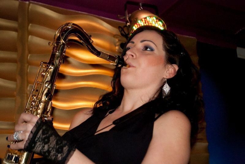 female saxophone player surat