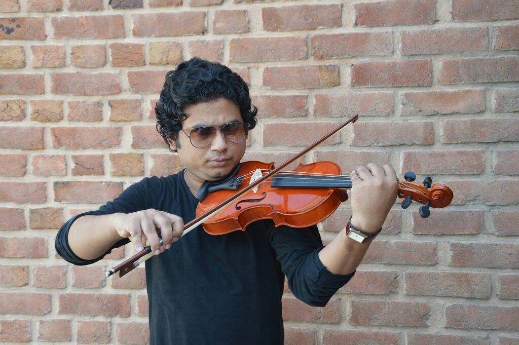 best violin player surat